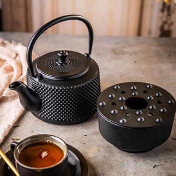 Elegante Teekanne mit Rechaud aus Gusseisen, schwarz: für langanhaltende Wärme & stilvollen Teegenuss