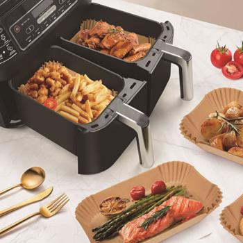 Preview: Ölbeständige Backpapier-Einlagen für Heissluftfritteusen, 100 Stück, 22x14 cm, antihaft, hitzebeständig & passgenau, für sauberes & einfaches Frittieren