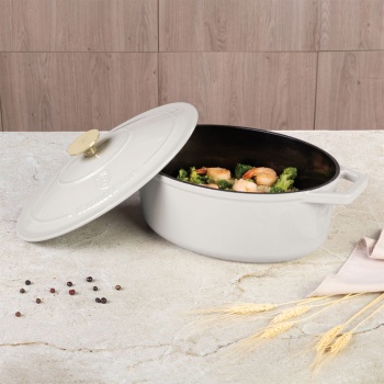 Preview: Ovaler Bräter Ø30cm Gusseisen Schmortopf, induktionsgeeignet: Eleganter Brattopf & Kasserolle zum Schmoren, Braten & Backen, Creme