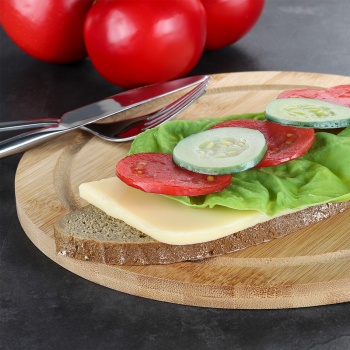 Preview: Rundes Bambus Schneidebrett - Praktische Saftrille & robuste Oberfläche - Für Obst, Gemüse, Kräuter & Frühstücksteller - Ø 25x1,2cm