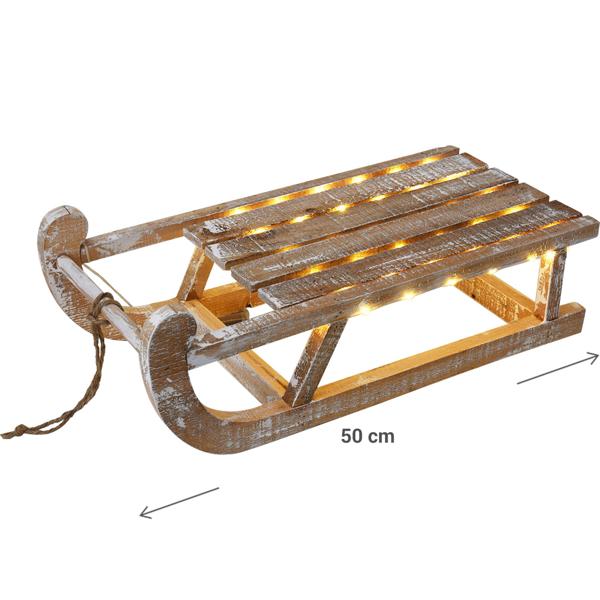 Dekorativer Rustikaler Leuchtschlitten aus Holz mit 50 warmweissen LEDs und Timer-Funktion. Für festliche Deko, Weihnachten & gemütliche Winterabende