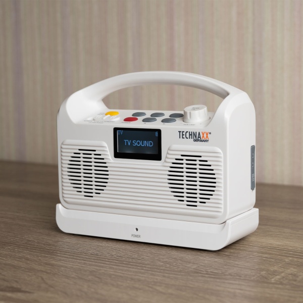 Kabelloser TV Lautsprecher: Mobile Hörhilfe für Fernseher - Basisstation, Bluetooth, LCD, Radio, SOS & Optischer Anschluss - Perfekt für Senioren