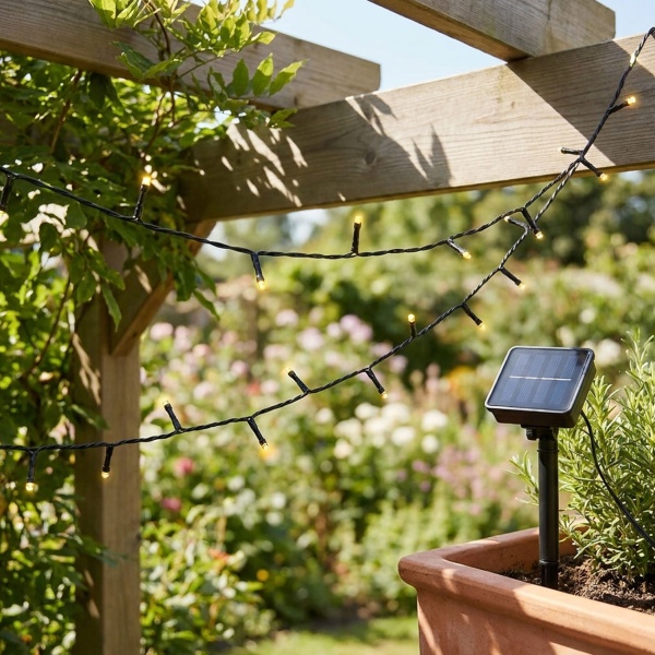 Solar Lichterkette mit 100 warmweissen LEDs für den Aussenbereich: 12,5m Gesamtlänge, automatischer Dämmerungssensor, ideal für Garten, Balkon & Terrasse