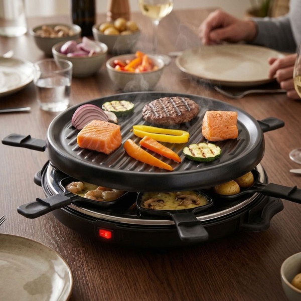 Raclette Grill rund für 6 Personen 800 W, Raclette Ofen mit abnehmbarer antihaftbeschichteter Grillplatte und 6 ovalen Pfännchen, Edelstahl Reflektor