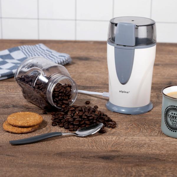 Elektrische Kaffeemühle 150W - Mahlt Bohnen Nüsse Samen - Korrosionsbeständige Stahlklingen - Transparenter Deckel - Rutschfeste Füsse - 17.5x9.5x9.8cm