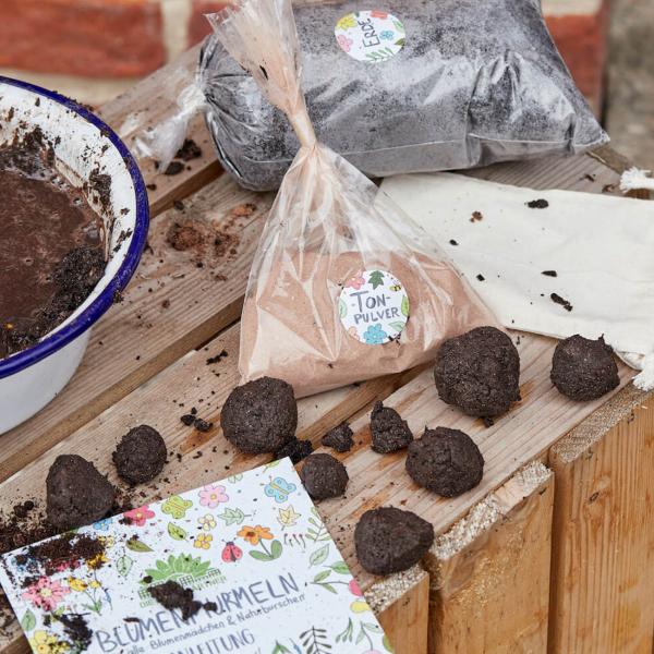 Samenbomben Kit zum Selbermachen - 30 bunte Blumenmurmeln mit Saatgut, Gartenerde, Lehmpulver & Anleitung - 100% Naturmaterialien